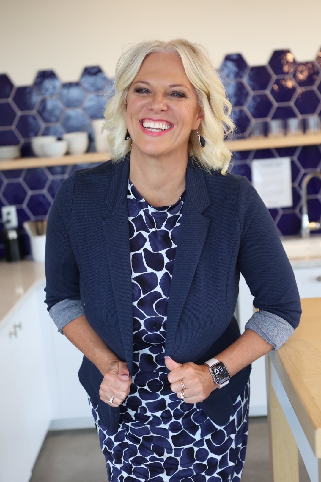 Jessica Pierce in a navy blazer, smiling warmly